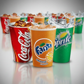 Three soda cups with Coca-Cola, Fanta, and Sprite logos on a transparent background